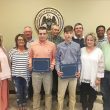 Supervisors award scholarships; agree to advertise for garbage truck