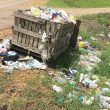 Loose garbage is a problem, but carts are an expensive option for the county