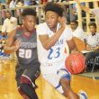 Lady Wildcats, Trojans collect wins on hardwood