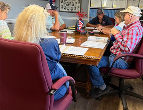 Pittsboro awards bids for surplus equipment; discusses meter at well
