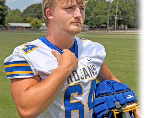Charlie Poynor to set the standard up front for the Trojans