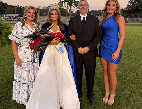 Bruce crowns a queen; Trojans & Cougars win while Rams and Wildcats fall